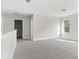 Light and airy bonus room featuring neutral walls and plush carpeting at 3787 Lockaby Way, Lawrenceville, GA 30044