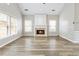 Charming living room featuring a fireplace and hardwood flooring at 9811 Spyglass Dr, Villa Rica, GA 30180