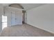 This bedroom features neutral carpeting, vaulted ceilings, double closets and plenty of natural light at 2822 Ward Lake Way, Ellenwood, GA 30294