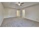 Expansive main bedroom featuring a ceiling fan and ensuite bath at 2822 Ward Lake Way, Ellenwood, GA 30294