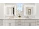 Modern bathroom with double vanity, backlit mirrors, and a sleek design at 971 Boulevard Se # B, Atlanta, GA 30312