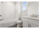 Elegant bathroom featuring subway tile, modern fixtures, and ample natural light at 971 Boulevard Se # B, Atlanta, GA 30312