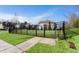 Community dog park with black metal fence and convenient water hose at 238 Gallant Fox Way, Acworth, GA 30102