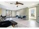 Spacious bedroom featuring recessed lighting, private balcony and modern accent wall at 662 S Grand Nw Ave, Atlanta, GA 30318