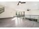 Second-floor bonus room featuring a ceiling fan, recessed lighting, and staircase access at 662 S Grand Nw Ave, Atlanta, GA 30318