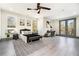 Bright main bedroom featuring recessed lighting, a ceiling fan, and balcony access at 662 S Grand Nw Ave, Atlanta, GA 30318