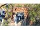 Aerial view of a property with a large backyard, a storage shed, and surrounded by trees at 71 Presley Farm Ln, Rockmart, GA 30153