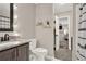 Bathroom with a granite-style vanity, framed mirror, neutral walls, and decorative shower curtain at 71 Presley Farm Ln, Rockmart, GA 30153