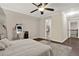 Bedroom with a vanity table, soft carpet, an exit door, and natural light at 71 Presley Farm Ln, Rockmart, GA 30153