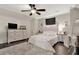 Bedroom featuring a ceiling fan, a TV atop a dresser, and a bed at 71 Presley Farm Ln, Rockmart, GA 30153