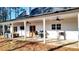 Covered patio with ceiling fans, outdoor furniture and a grill for outdoor entertaining at 71 Presley Farm Ln, Rockmart, GA 30153