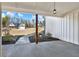 View from covered patio onto landscaped yard and other homes in this new construction community at 71 Presley Farm Ln, Rockmart, GA 30153