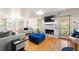 Cozy living room featuring hardwood floors and a modern fireplace at 1031 Steeple Run, Lawrenceville, GA 30043