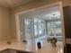 Modern kitchen with pass through to sunroom at 1055 Pinecrest Dr, Forest Park, GA 30297