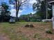 Backyard featuring a tree stump and grass at 5325 Victory Blvd, Morrow, GA 30260