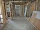 Basement under construction featuring wooden framing and a concrete floor at 5325 Victory Blvd, Morrow, GA 30260