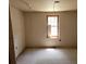 A partially finished bedroom featuring white sheetrock and a window at 5325 Victory Blvd, Morrow, GA 30260