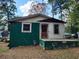 Exterior view of home with a small porch and partial white brick at 5325 Victory Blvd, Morrow, GA 30260