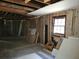 Interior view of a room under construction, featuring exposed framing and a window at 5325 Victory Blvd, Morrow, GA 30260