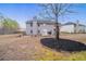 Large backyard with trees providing shade at 3860 Busby Mill Ct, Ellenwood, GA 30294