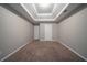 Bedroom featuring carpet flooring and two doors at 3860 Busby Mill Ct, Ellenwood, GA 30294