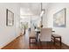 Dining area showcases hardwood floors, natural light, and convenient access to the adjoining kitchen and staircase at 965 Boulevard Se # A, Atlanta, GA 30312