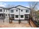 Modern new construction townhome with dual garages and black trimmed windows at 965 Boulevard Se # A, Atlanta, GA 30312