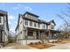 Stunning two-story modern farmhouse with covered porch, meticulous landscaping, and ample driveway space at 965 Boulevard Se # A, Atlanta, GA 30312