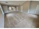 Expansive bonus room with neutral color palette perfect for versatile use at 7214 Bedrock Cir, Lithonia, GA 30038