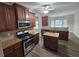 Modern kitchen with stainless steel appliances, granite countertops, and ample cabinet space at 7214 Bedrock Cir, Lithonia, GA 30038