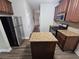 Stylish kitchen with stainless steel appliances, island and modern cabinetry at 7214 Bedrock Cir, Lithonia, GA 30038