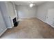 Spacious living room with fireplace and plush carpeting for a cozy atmosphere at 7214 Bedrock Cir, Lithonia, GA 30038