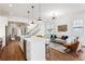 Spacious Living room open to dining and kitchen area with an island and hardwood floors at 965 Boulevard Se # B, Atlanta, GA 30312