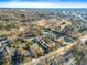 Scenic aerial view of multi-Gathering residences surrounded by trees, cemetery and city views at 1179 Church St # J, Decatur, GA 30030