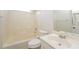 Bathroom with tub-shower combo, toilet, and vanity at 2750 Dominion Walk Ln, Snellville, GA 30078