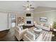 Bright and airy living room with vaulted ceiling, stone fireplace, and stylish neutral decor at 3764 Cherokee Overlook Dr, Canton, GA 30115