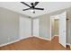 Bedroom featuring hardwood floors, closet space, and neutral wall color at 395 Pharr Ne Rd # 301, Atlanta, GA 30305