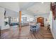 Open concept living room featuring hardwood floors, modern furnishings, and bright light at 4115 Merritt Dr, Cumming, GA 30041