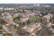 An aerial view of a college campus with brick buildings, green spaces, and tree-lined streets at 10 Clarke Hill St, Decatur, GA 30030