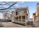 Two-story home with a large backyard and a screened in porch; perfect for entertaining outdoors at 10 Clarke Hill St, Decatur, GA 30030