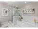 Modern bathroom featuring a glass shower, soaking tub, and neutral decor, creating a serene retreat at 10 Clarke Hill St, Decatur, GA 30030