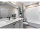 Bright bathroom with a large vanity, white subway tile, and a shower-tub combination at 10 Clarke Hill St, Decatur, GA 30030