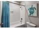 Bright bathroom featuring a shower-over-tub with white subway tiles, a curtain, and a toilet at 10 Clarke Hill St, Decatur, GA 30030