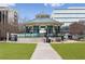 A gazebo with people in a town park with lush grass and greenery at 10 Clarke Hill St, Decatur, GA 30030