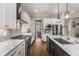 Modern kitchen featuring white cabinets, subway tile backsplash, and stainless steel appliances at 10 Clarke Hill St, Decatur, GA 30030