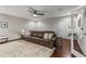 Comfortable living room features a ceiling fan, wood floors, and a plush rug for a cozy ambiance at 10 Clarke Hill St, Decatur, GA 30030