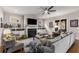 Cozy living room featuring a fireplace, built-in shelving, and comfortable seating arrangement at 10 Clarke Hill St, Decatur, GA 30030