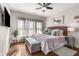 Inviting main bedroom with hardwood floors, decorative pillows, and a cozy atmosphere for ultimate relaxation at 10 Clarke Hill St, Decatur, GA 30030