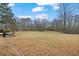 Large, open backyard offers endless possibilities for recreation and outdoor activities at 21 Cass Station Pass Nw Pass, Cartersville, GA 30121