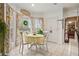 Bright breakfast nook with white tiled flooring, large windows and a view of the backyard at 21 Cass Station Pass Nw Pass, Cartersville, GA 30121